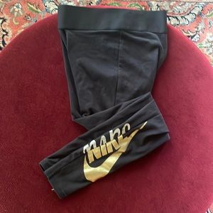Nike leggings gold and silver logo